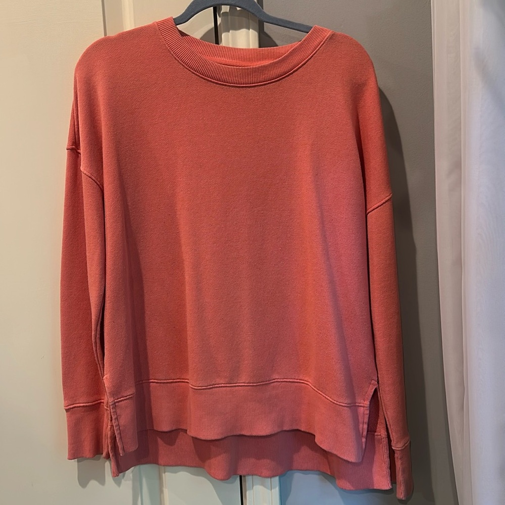 This item is coral and not too thick or thin!